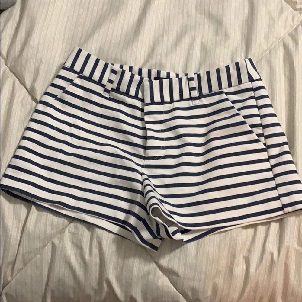 Navy blue and white shorts.
